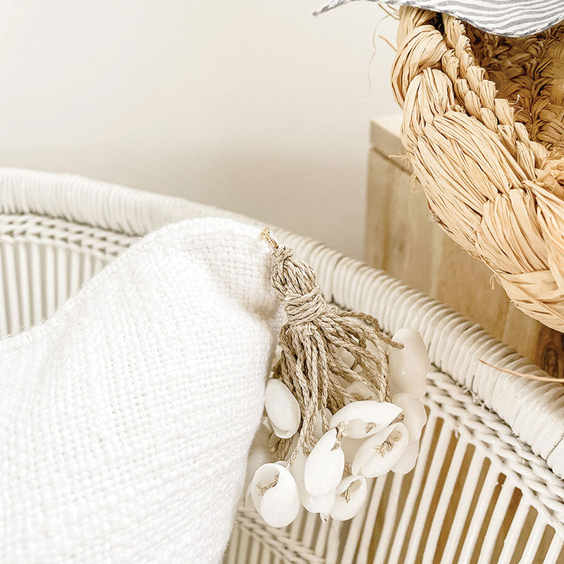 WHITE CUSHION AND SHELL TASSELS